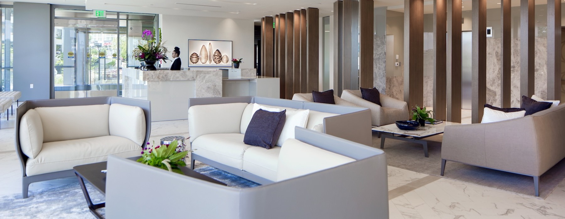 a clubroom with couches and chairs